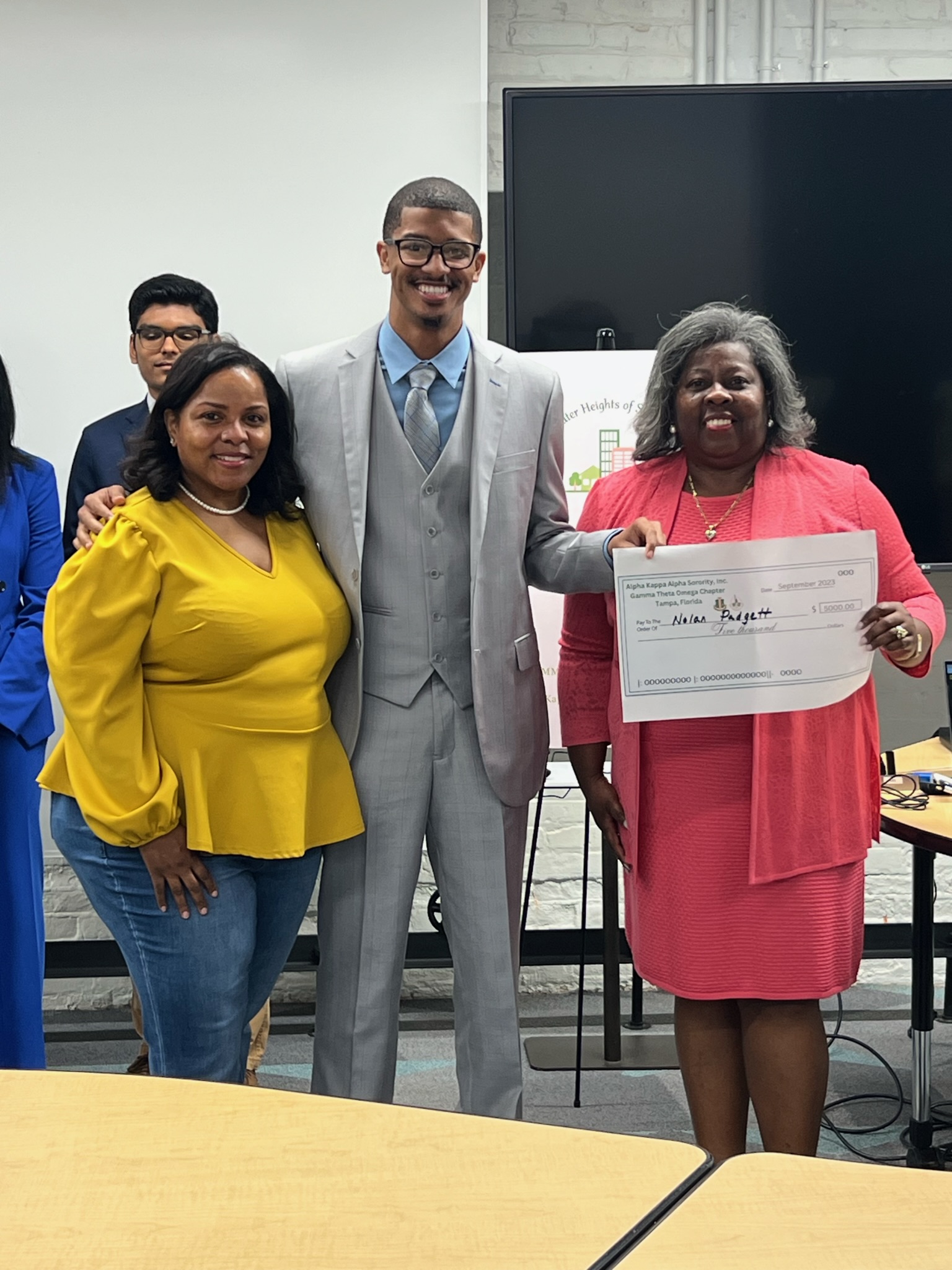 STRIVE Youth participant receiving a scholarship award